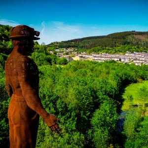 The Guardian of the Valleys was designed by artist Sebastien Boyesen and is a memorial to those killed in the Six Bells mining disaster of 1960.